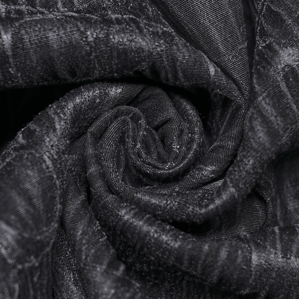 Close-up of snake texture fabric for cyberpunk style trousers, showcasing rich black tones and unique woven pattern.