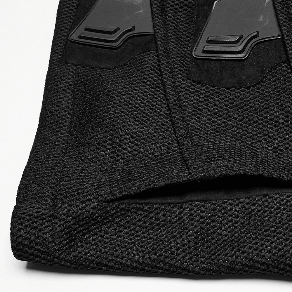 Close-up of a cyberpunk mesh and leather vest featuring 3D rubber detailing, highlighting intricate textures.