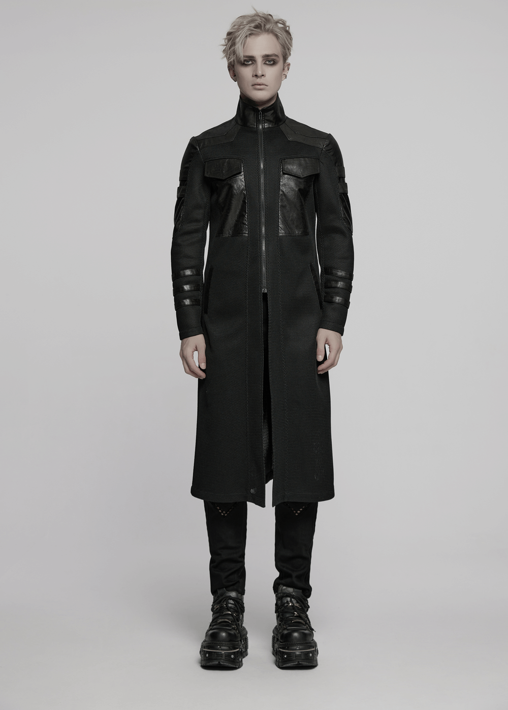 Sleek black cyberpunk coat with geometric design, large pockets, and decorative straps for a modern style.