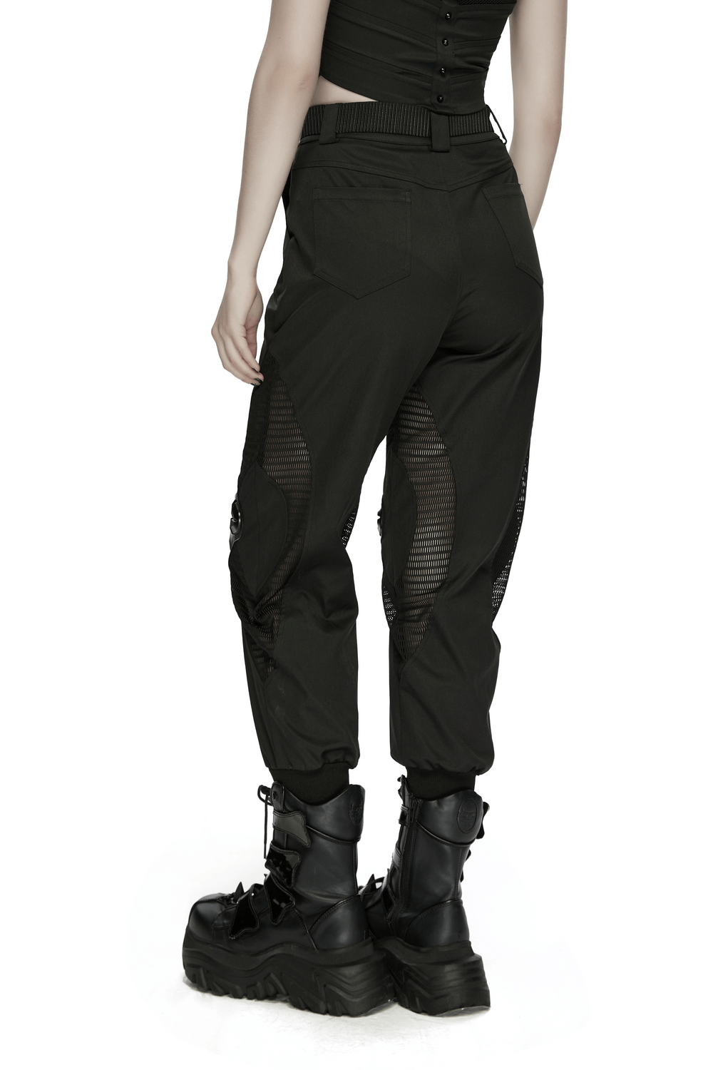 Back view of Cyberpunk Mesh Cargo Jogger Pants with Rubber Knees, showcasing mesh panels and stylish boots.