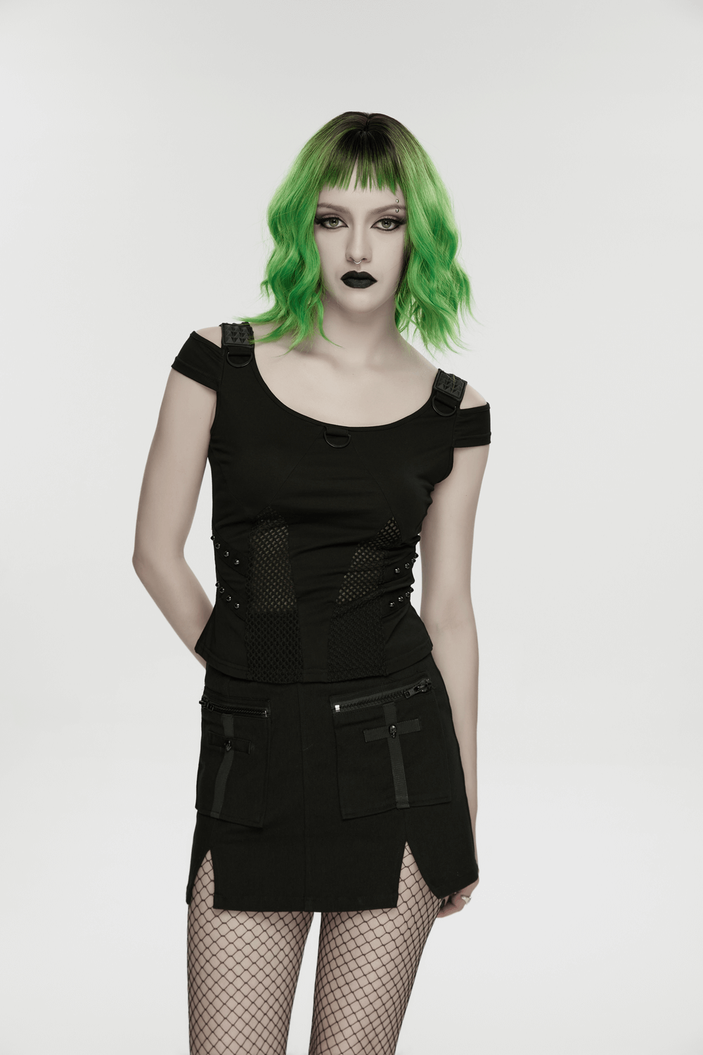 Cyberpunk Mesh Panel Short Sleeved T-Shirt for Women worn by model with green hair and edgy makeup.