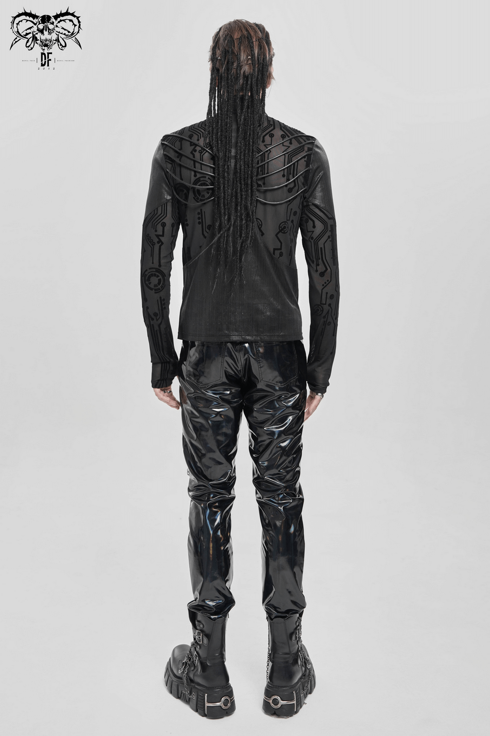 Cyberpunk Mesh Top with Futuristic Print and Zipper Neck worn with glossy pants, showcasing geometric patterns and layered design.