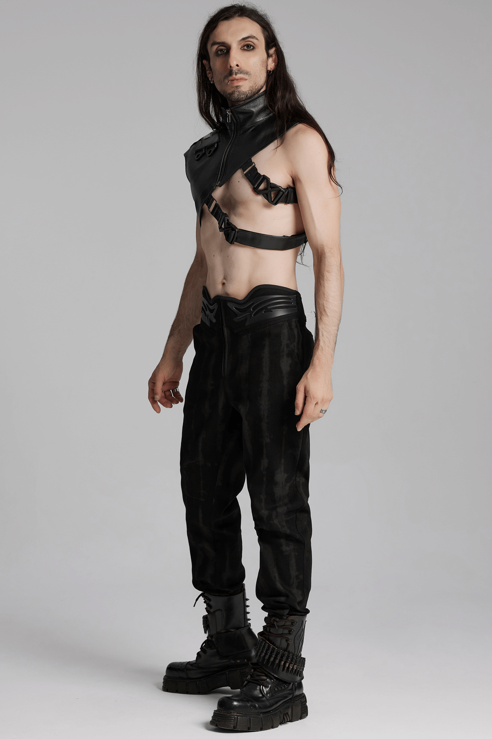 Cyberpunk shoulder armor with adjustable buckles, showcasing edgy style and textured fabric on a model.