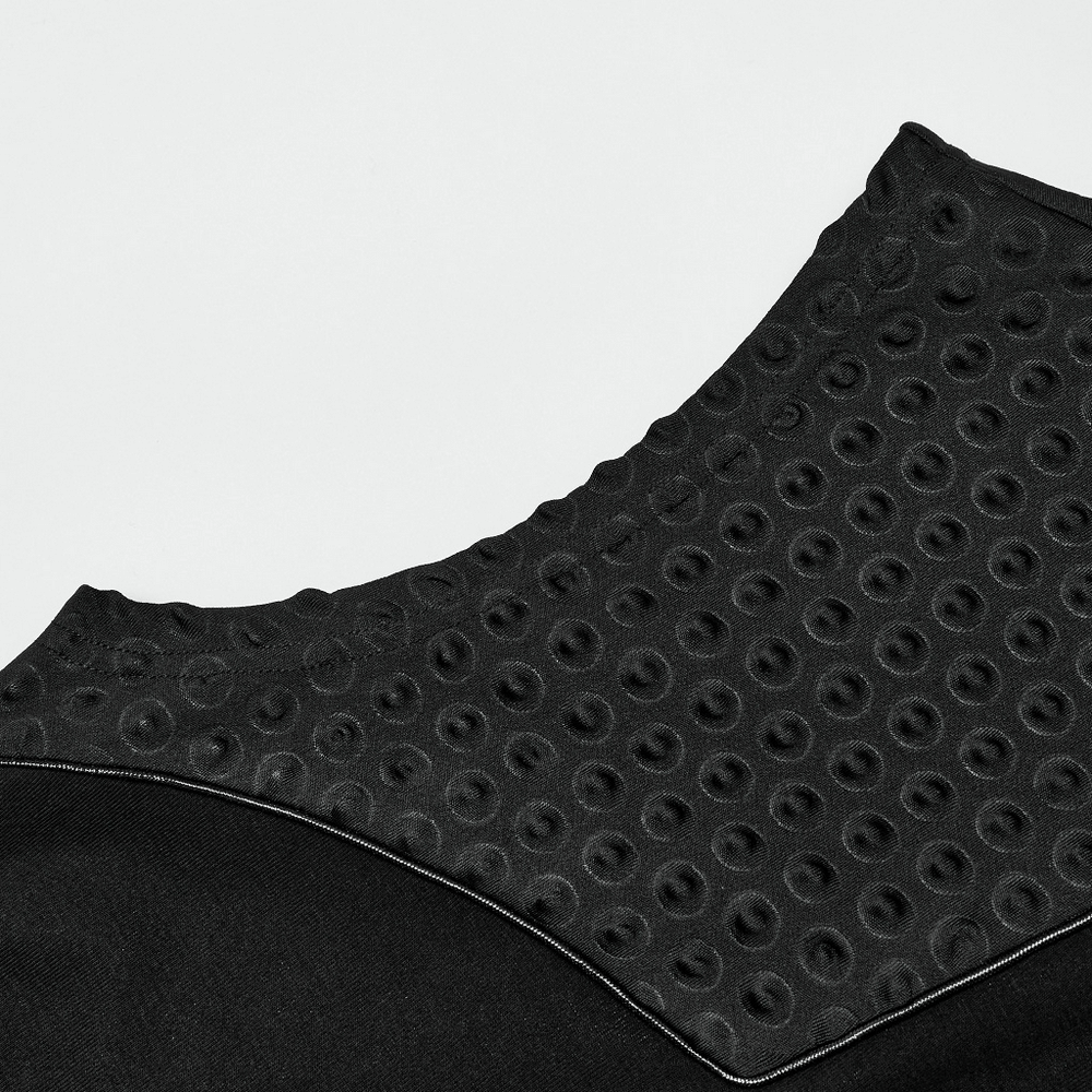 Close-up of textured fabric on Cyberpunk sleeveless top with unique detailing and modern design.