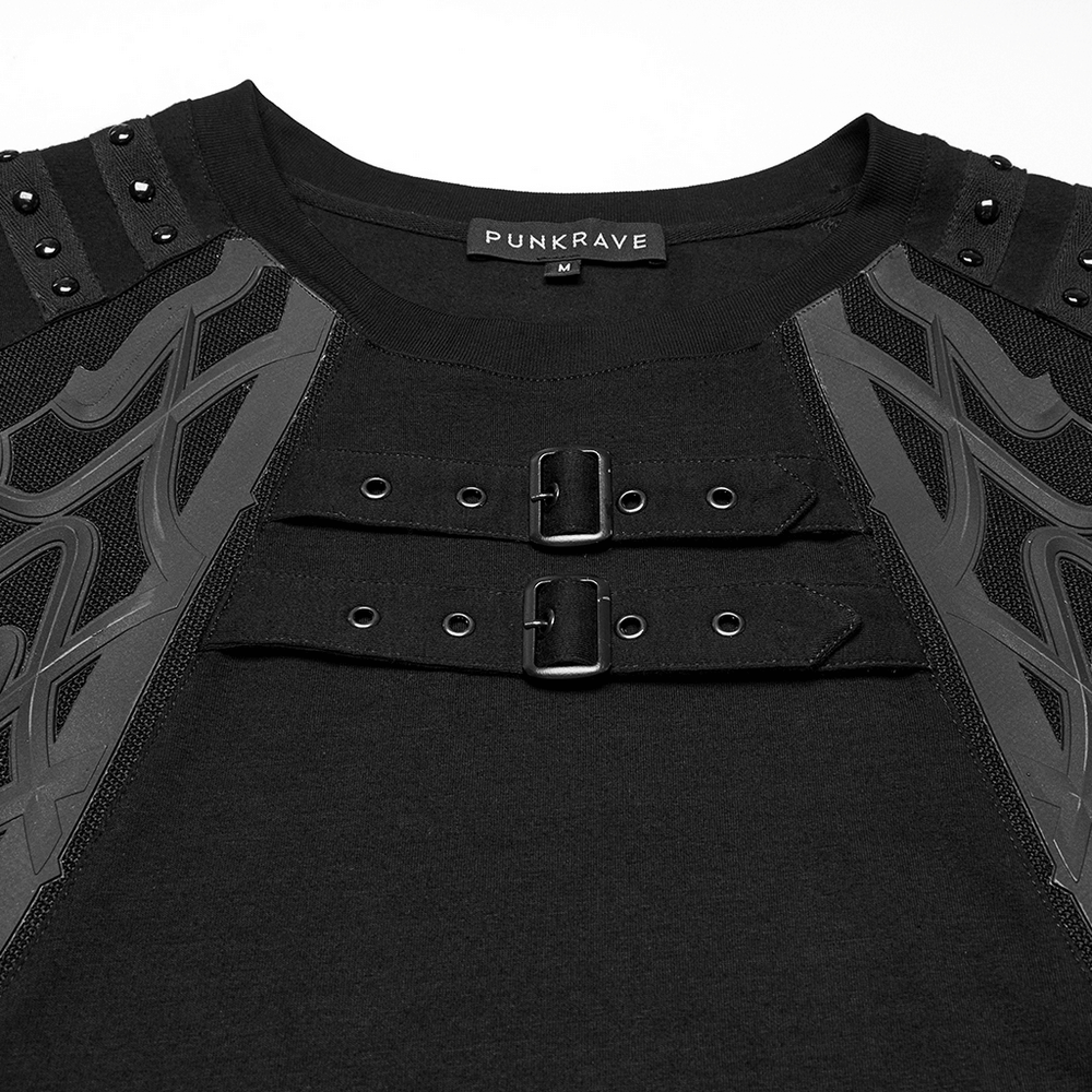 Close-up of a men's cyberpunk T-shirt featuring studded shoulder straps and unique fastening details.