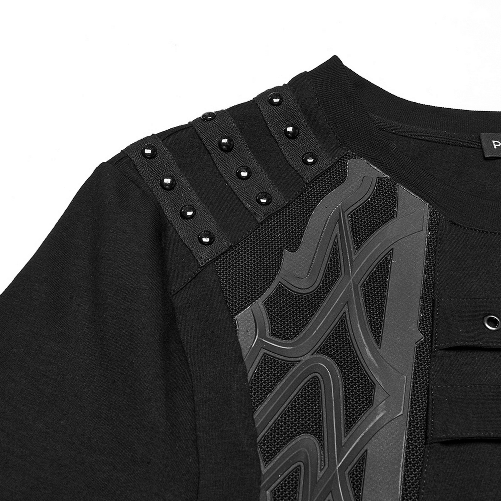 Close-up of a black Cyberpunk T-shirt showing studded shoulder straps and intricate side detailing.