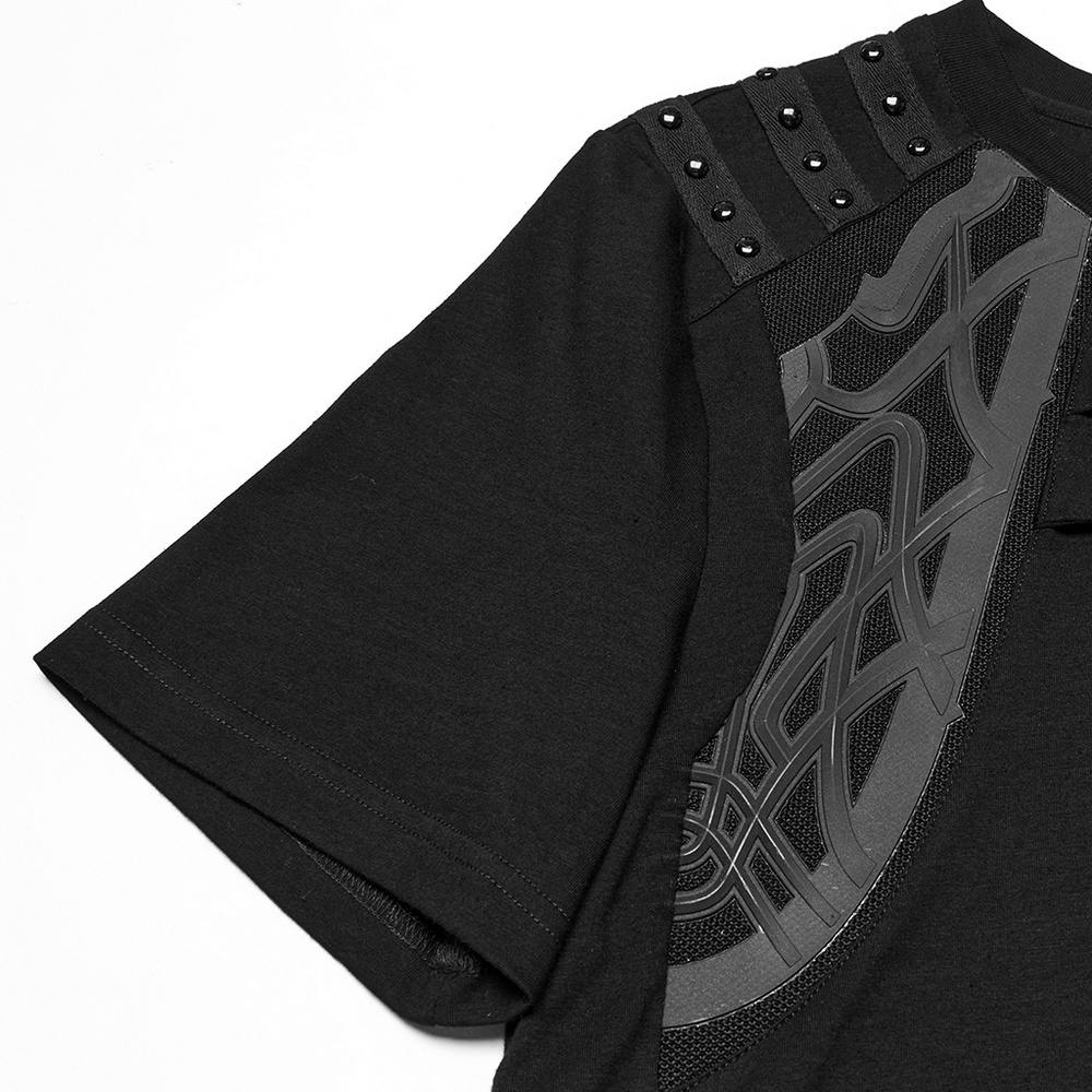 Close-up of a black cyberpunk t-shirt featuring studded shoulder straps and unique mesh detailing.