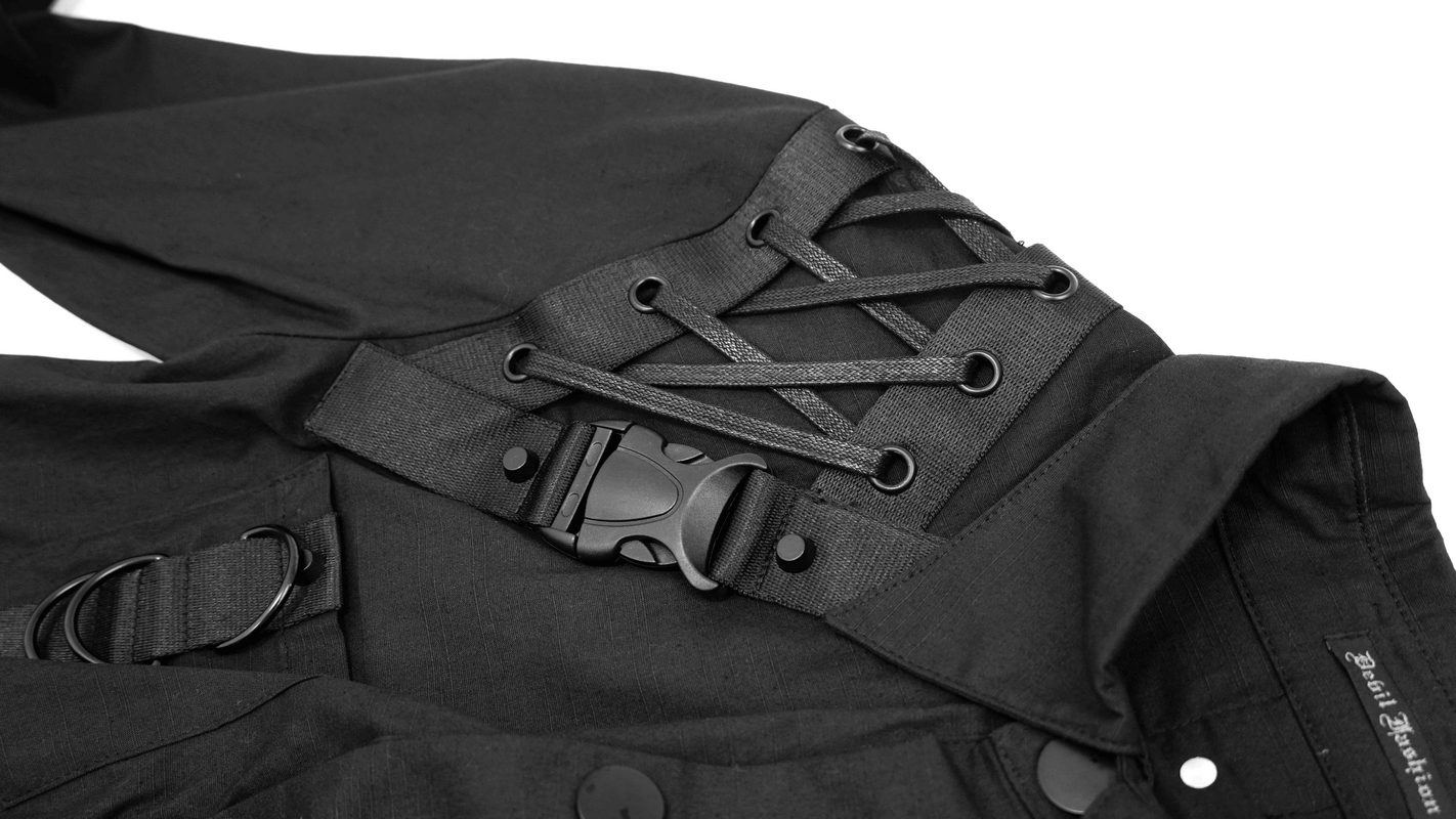 Close-up view of a black cyberpunk style men's long sleeve shirt featuring strap details and creative lacing.