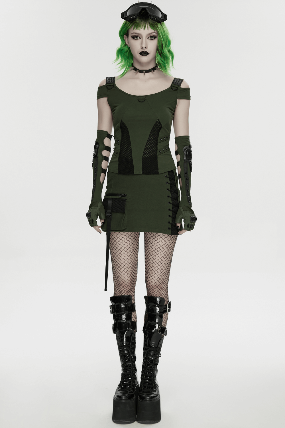 Cyberpunk T-shirt with Mesh Detailing and Rivets Loops worn by a model with green hair and edgy accessories.