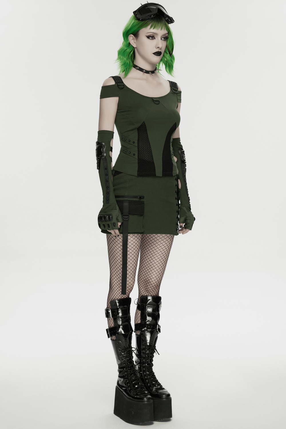 Cyberpunk T-shirt with Mesh Detailing and Rivets Loops worn by model with green hair and edgy accessories.