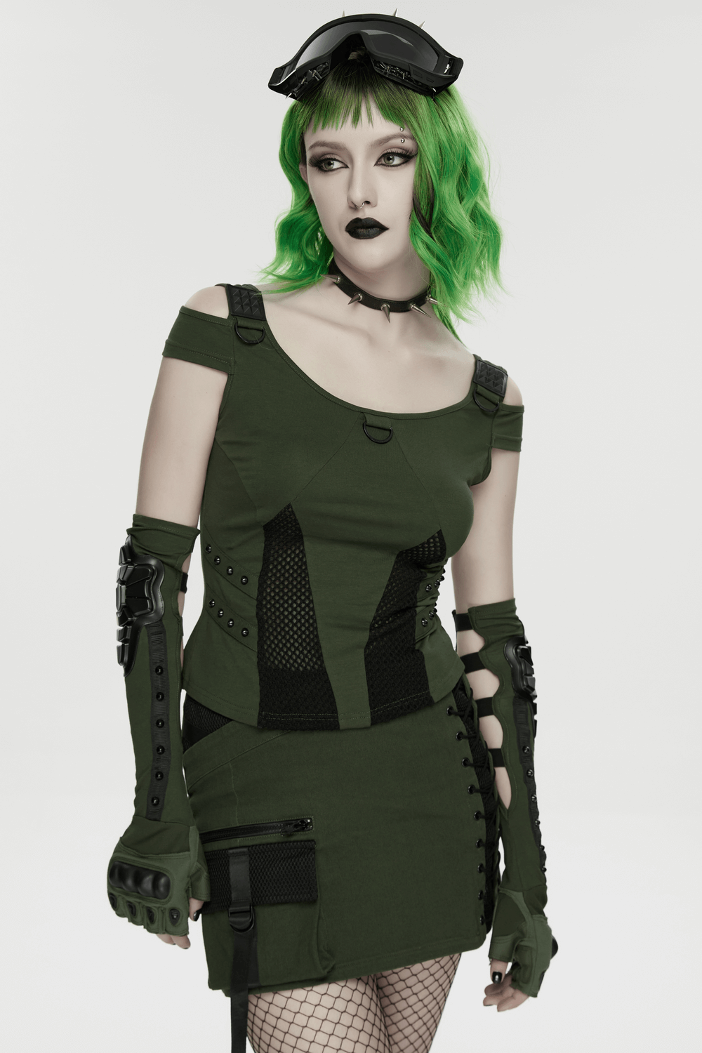 Cyberpunk T-shirt with Mesh Detailing and Rivets Loops modeled by a model with green hair in a stylish outfit.