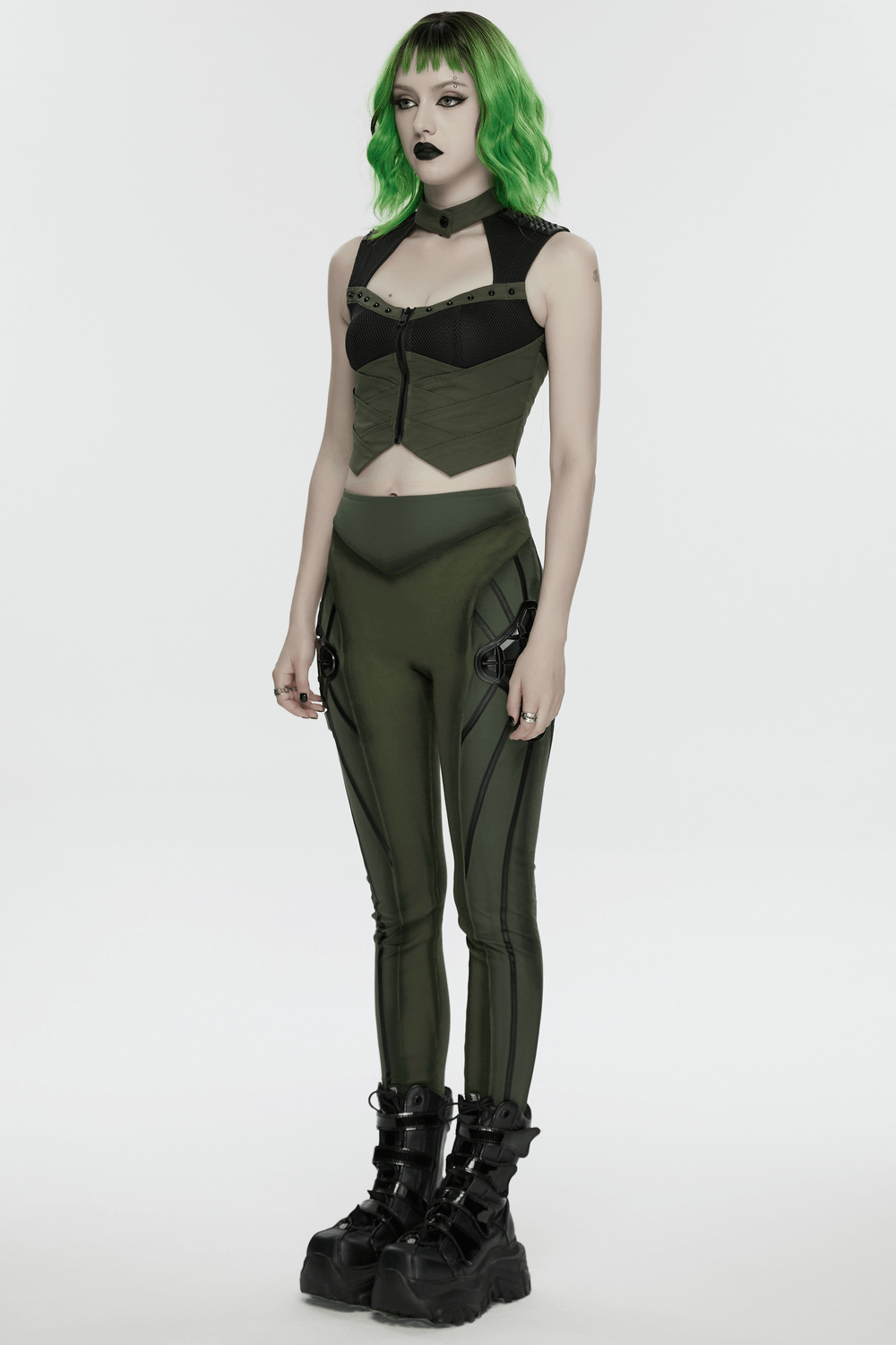 Cyberpunk Tactical Top with Mechanical Back Plate model wearing tactical outfit and bold green hair.