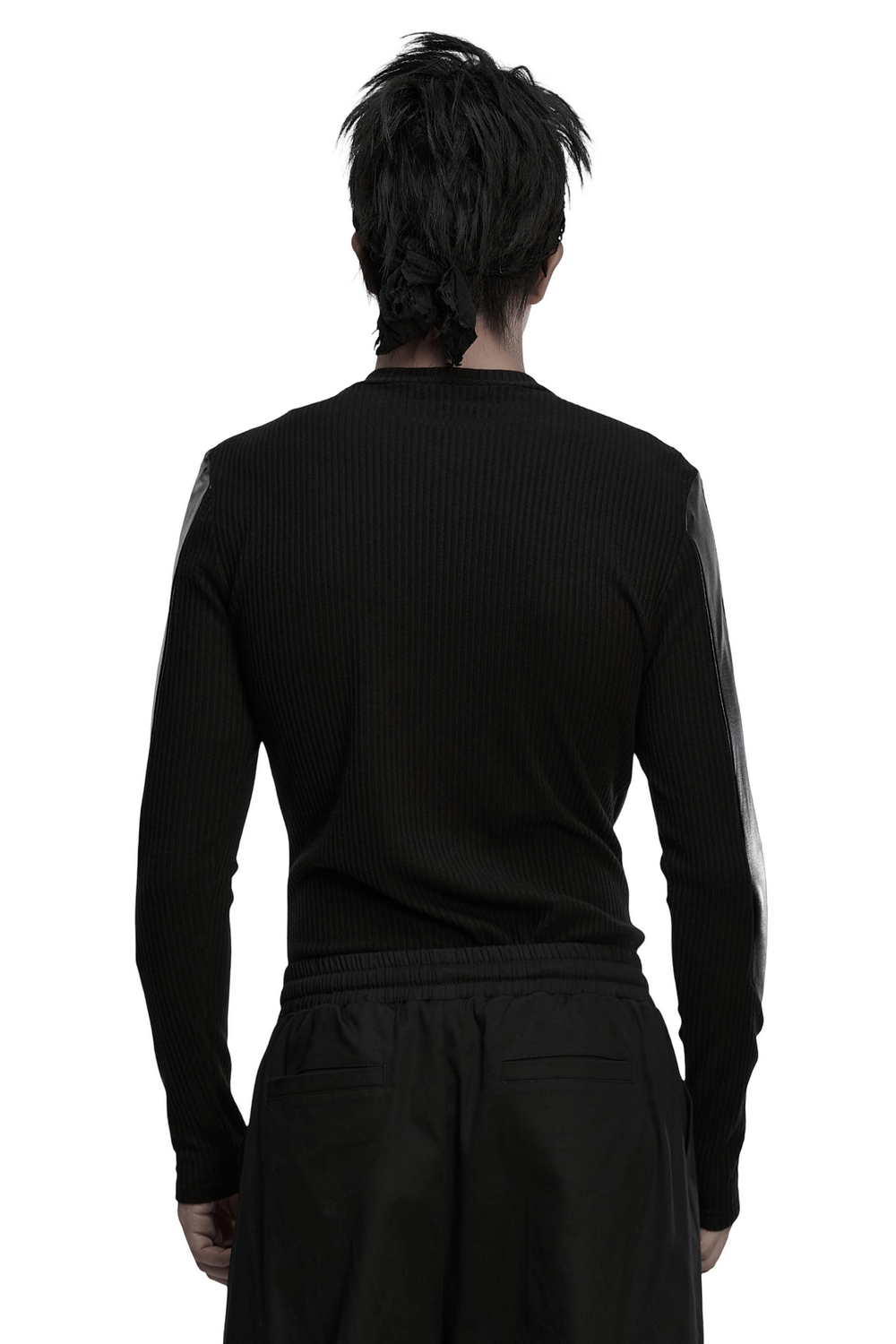 Cyberpunk Top with Metal Studs and Mesh Accents viewed from the back showcasing ribbed fabric and leather look panels.