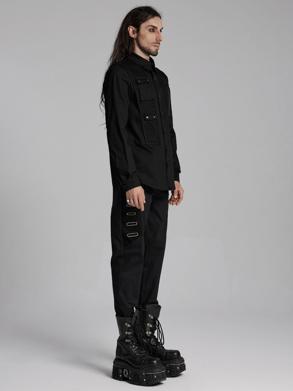 Cyberpunk twill shirt with mesh panels and 3D pockets, paired with stylish black pants and chunky boots.