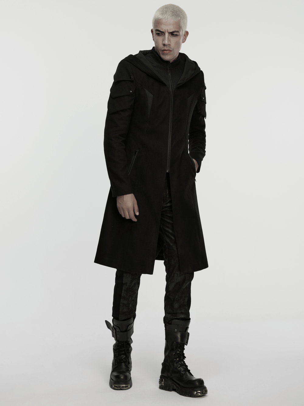 Cyberpunk Velvet Hooded Coat with Armor Shoulder Design modeled by an individual in a sleek, futuristic setting.