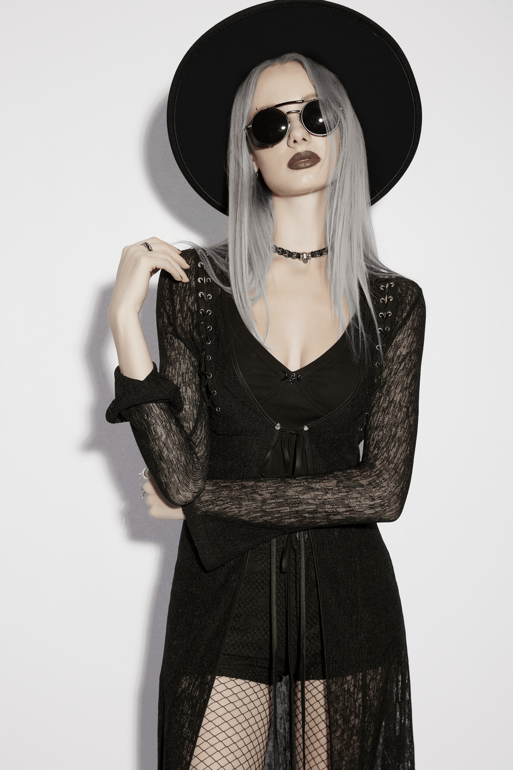 Daily Sun Protection Cape with Sheer Gothic Drape styled with accessories and a hat, showcasing casual gothic elegance.