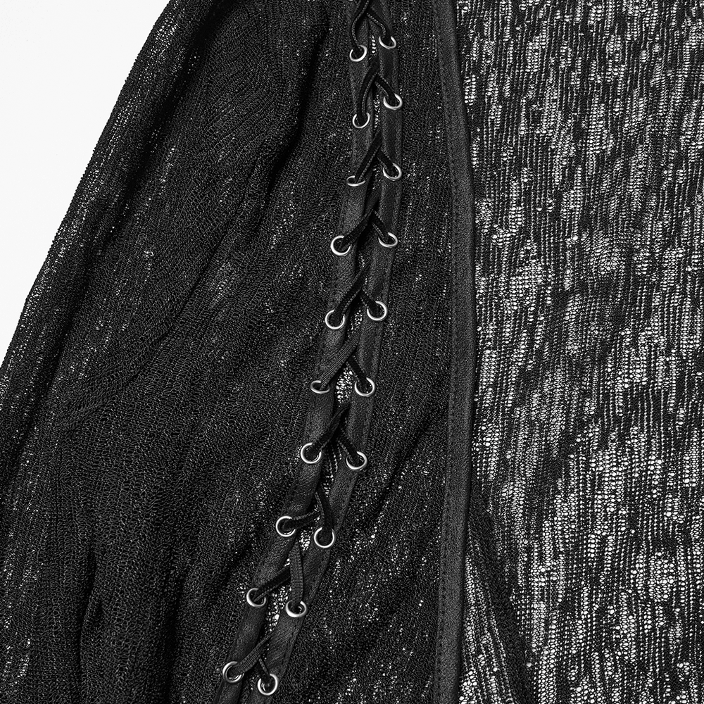 Detail shot of Daily Sun Protection Cape with Sheer Gothic Drape showcasing side drawstrings and textured knit fabric.