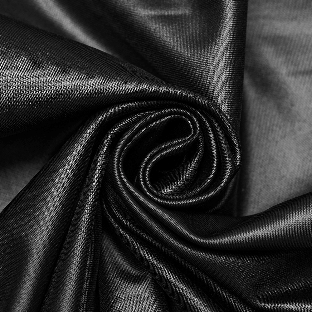 Close-up of luxurious black fabric, perfect for a gothic dress, showcasing its smooth texture and rich color.