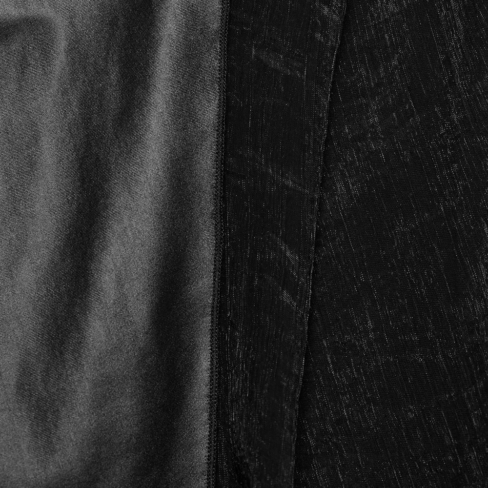 Close-up of black fabric textures showcasing the sleek and edgy look of the Daring Gothic Maxi Dress.