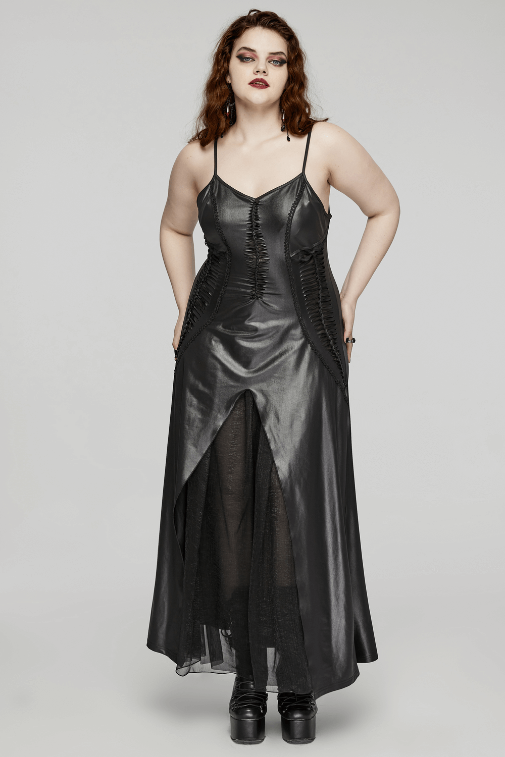 Daring Gothic maxi dress with straps and lace-up back, featuring a hollow-out design in alluring black.