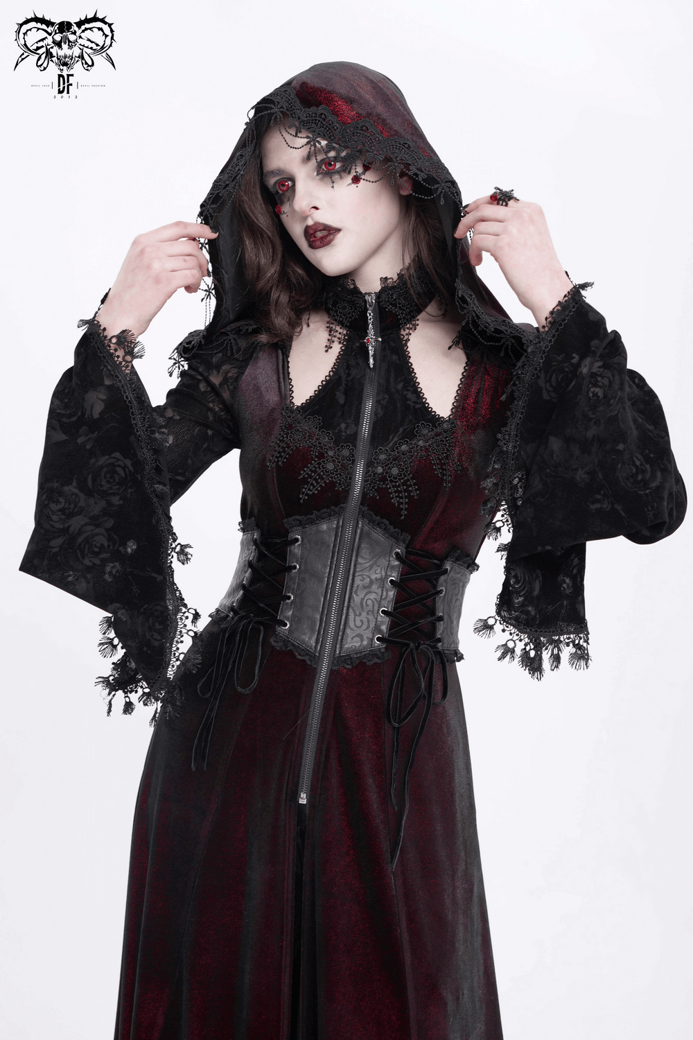 Gothic women's dark elegance maxi coat with lace sleeves and hood, showcasing dramatic corset waist and ethereal charm.