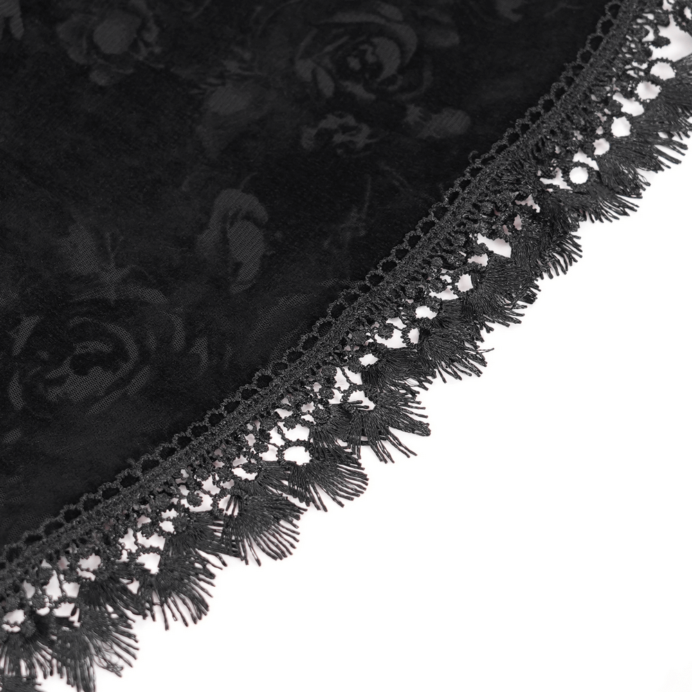 Close-up of the intricate lace trim on the black fabric, showcasing gothic elegance and dark allure.