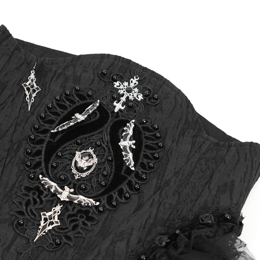 Detailed black lace and tulle underbust corset with gothic embellishments and intricate silver accents.