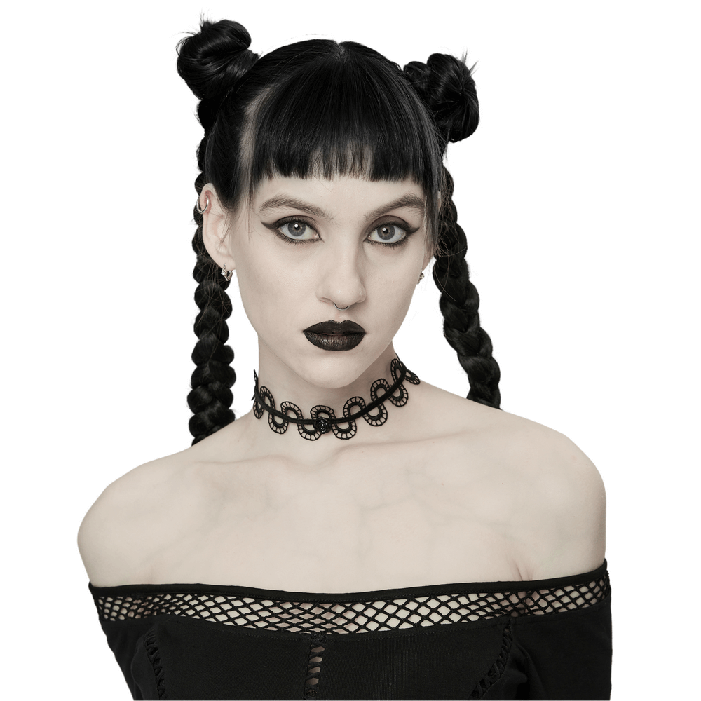 Model showcasing a dark floral snake lace choker necklace, with gothic hairstyle and dramatic makeup.