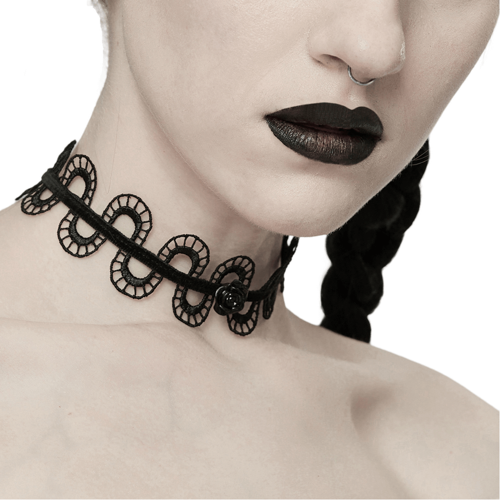 Elegant black lace choker necklace with intricate design, perfect for a gothic style and edgy fashion.