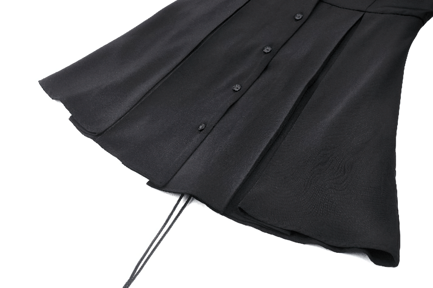 Close-up of a dark goth button-up dress with lace-up corset back and flared hem, highlighting its elegant silhouette.