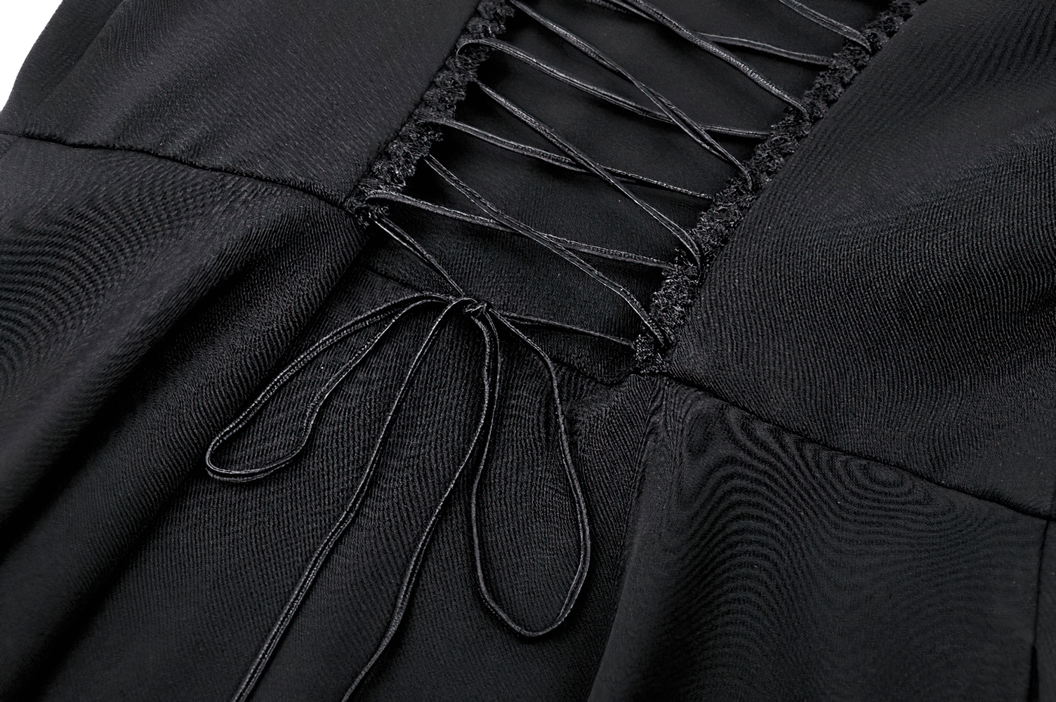 Close-up of the lace-up back detail on a black goth dress, showcasing its elegant structure and design.