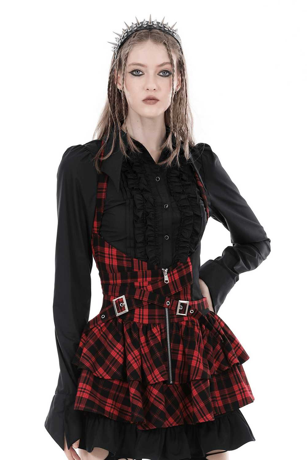 Gothic ruffle blouse with plaid skirt overlay, featuring dramatic ruffles and stylish accessories.