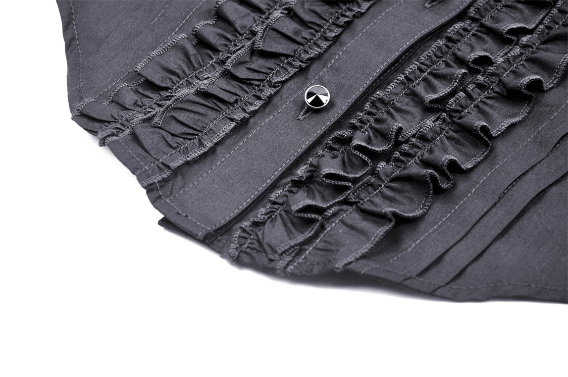 Close-up of dark gothic ruffle blouse with intricate ruffles and button detail, showcasing its elegant design.