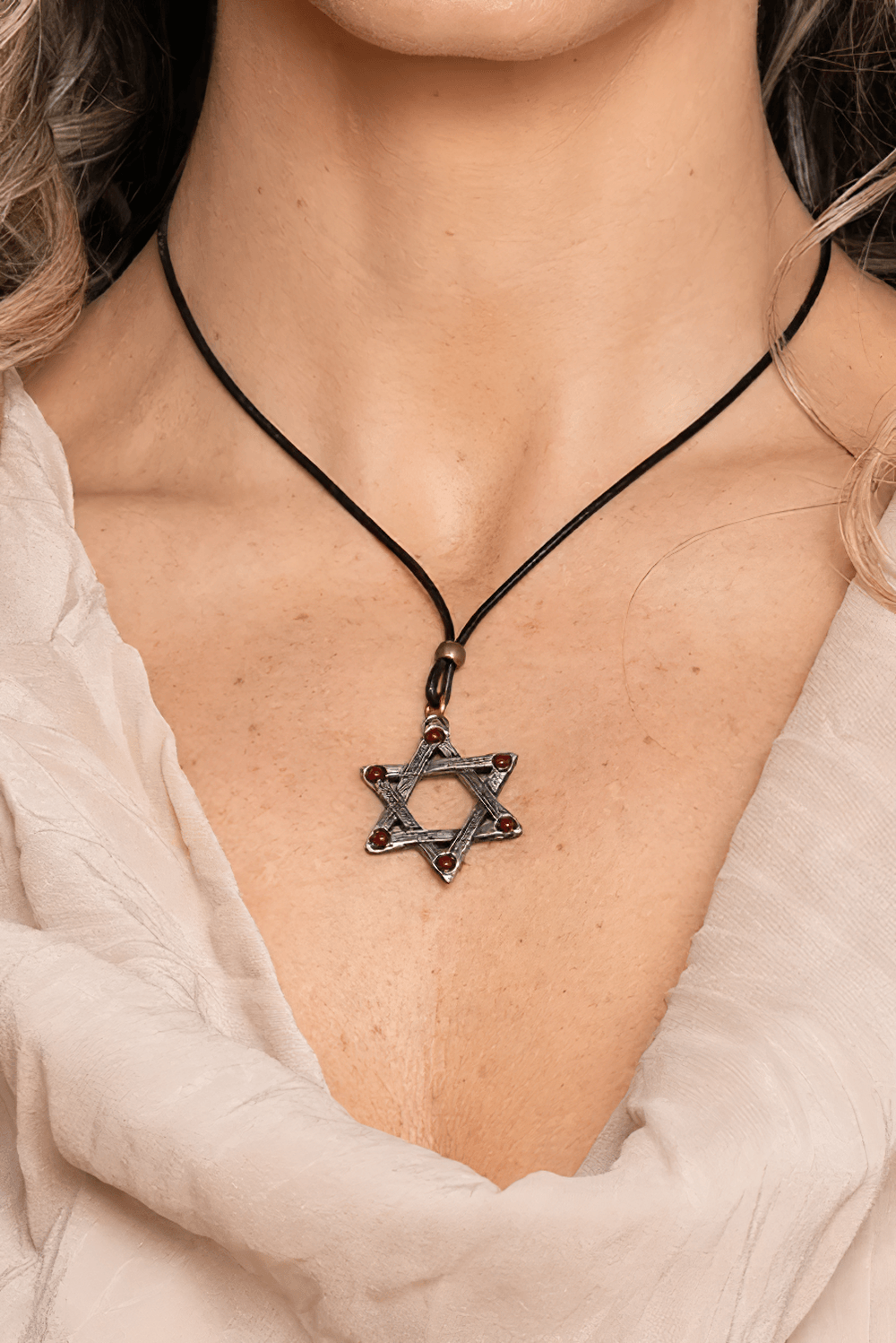 Dark Gothic Hexagram Carnelian Pewter Pendant worn on a model, showcasing its striking design and carnelian accents.
