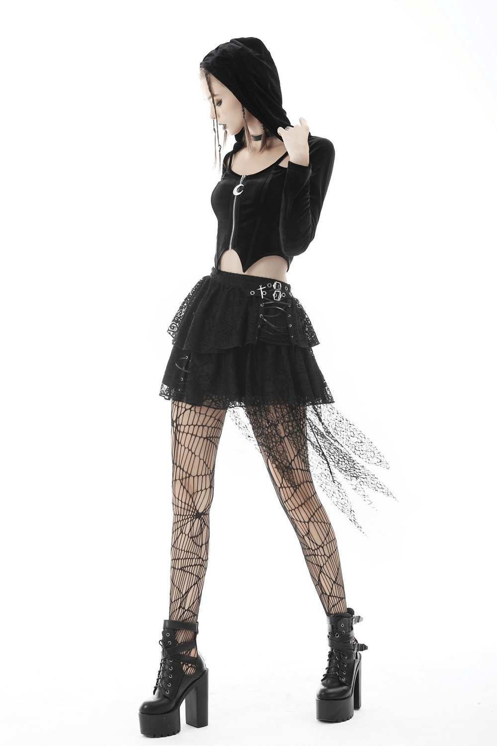Black Gothic mini skirt with layered lace, edgy mesh overlay, and punk vibe, styled with fishnet tights and platform boots.