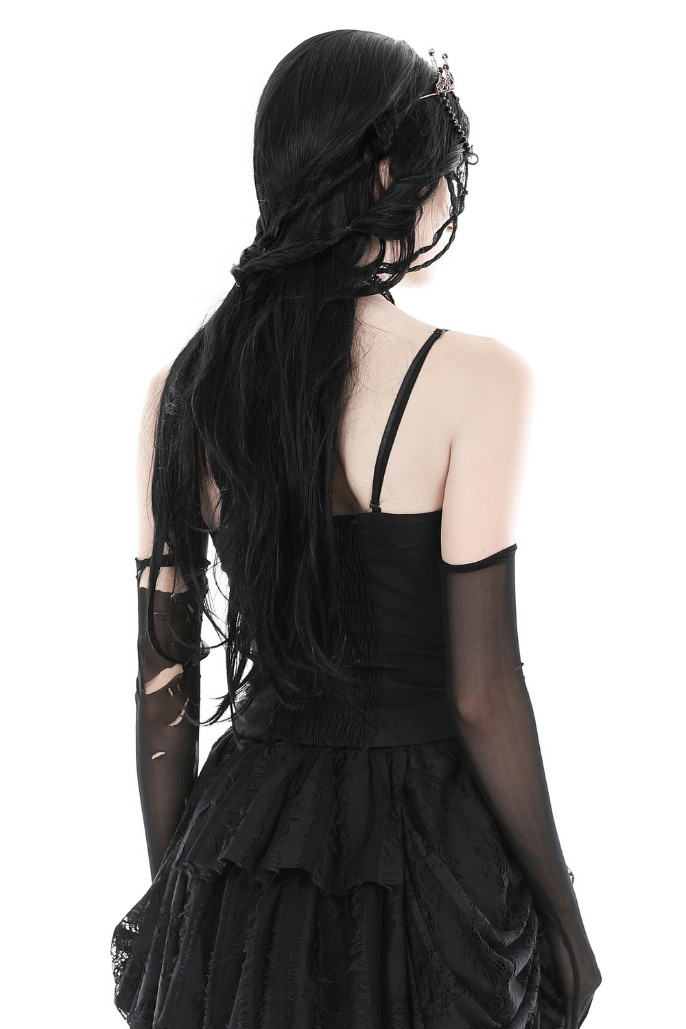 Back view of a model wearing a dark gothic lace-up corset with long black gloves and flowing hair.