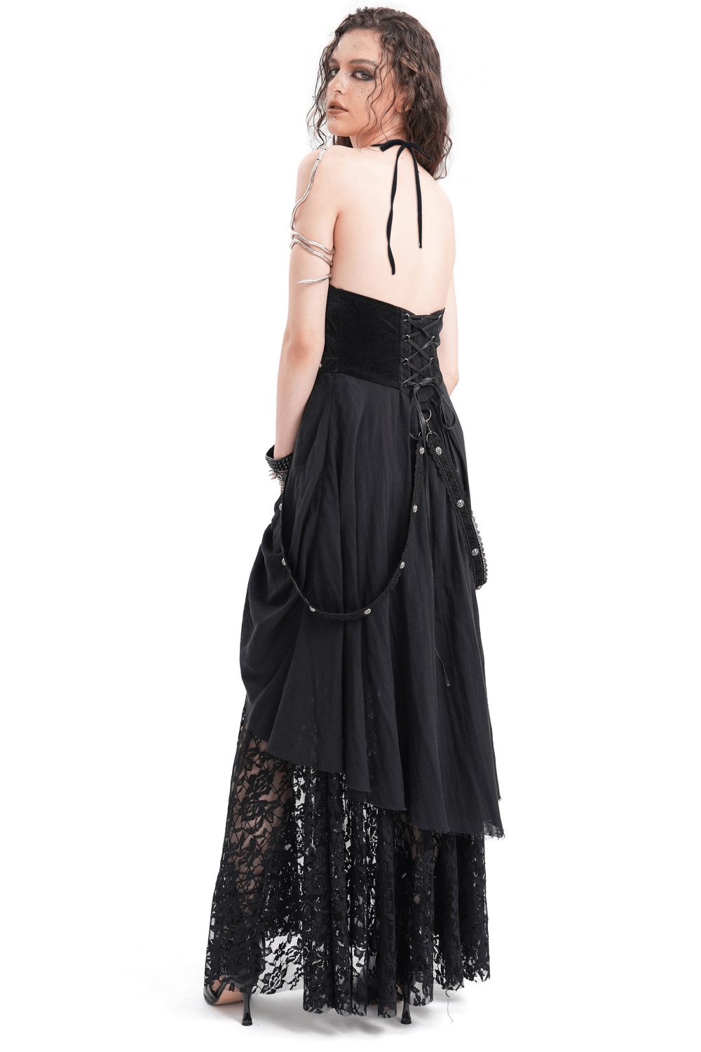 Dark Gothic layered dress with lace, corset details, and chain accents. Ideal for alternative fashion lovers seeking elegance and edge.