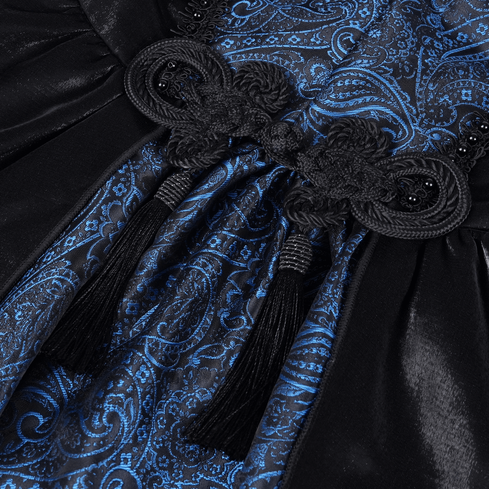 Dark blue and black Gothic dress fabric with intricate lace and tassel detail, showcasing elegant skull and paisley patterns.