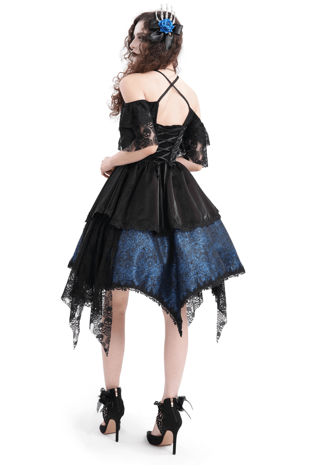 Gothic off-shoulder dress with blue and black lace, cross detail, and skull patterns, featuring an asymmetrical hem and lace-up back.