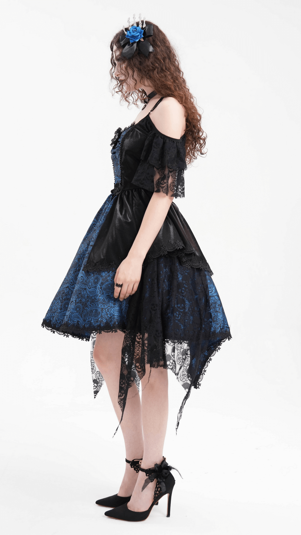 Elegant Gothic off-shoulder dress in dark blue and black satin and lace, featuring skull patterns and cross detail.