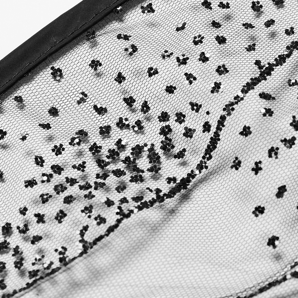 Detailed close-up of dark mesh fabric with shimmering wave patterns for gothic butterfly wings.