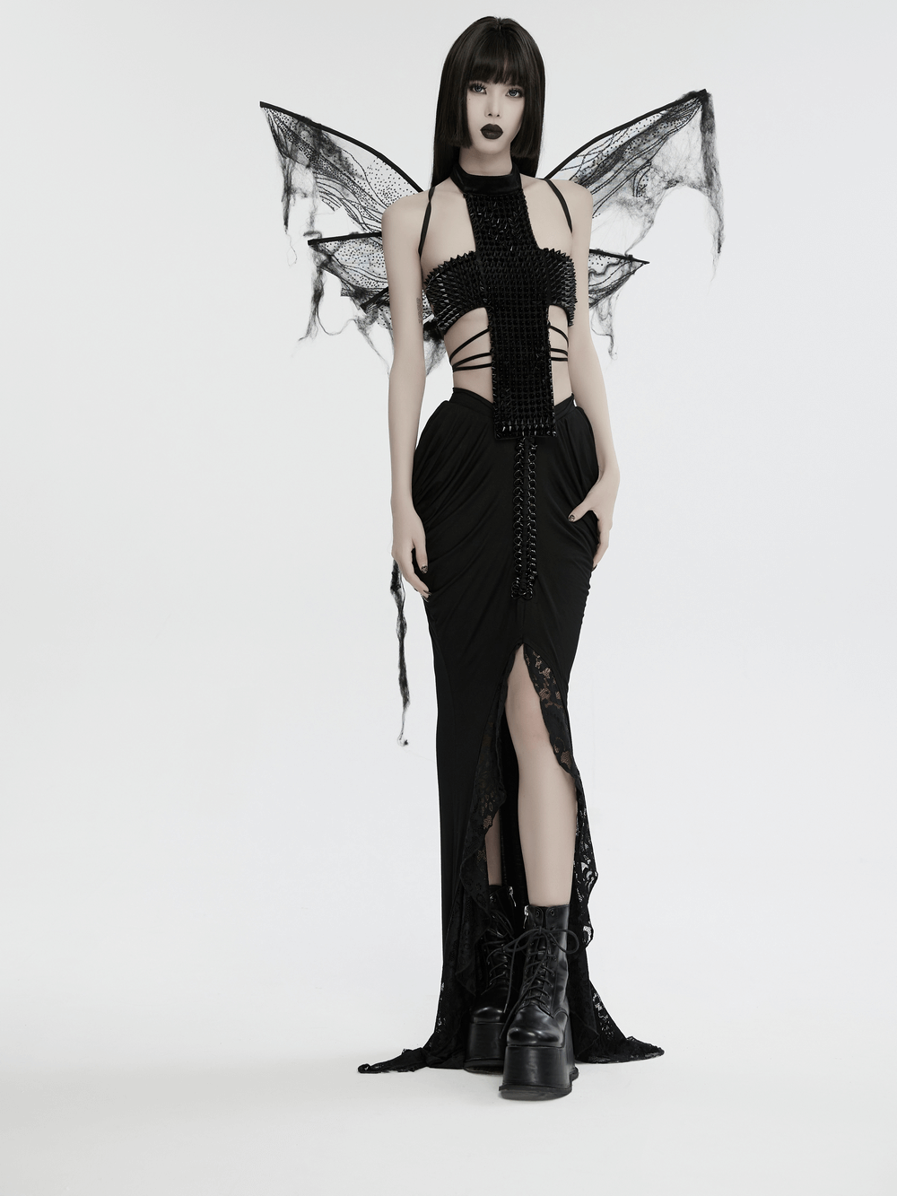Model showcasing dark gothic mesh butterfly wings and stylish black dress for a mysterious cosplay look.