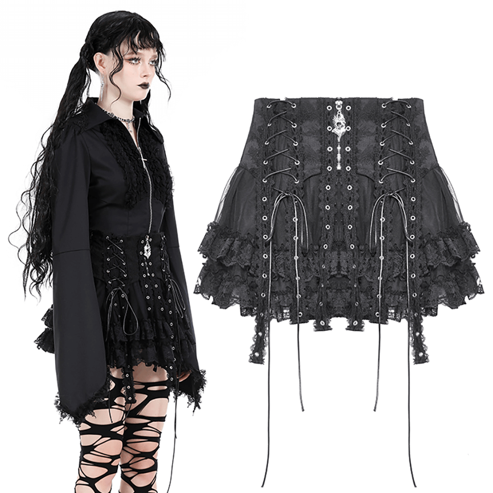 Dark gothic mini skirt with lace trim and cross detail, styled with a black top and edgy accessories.