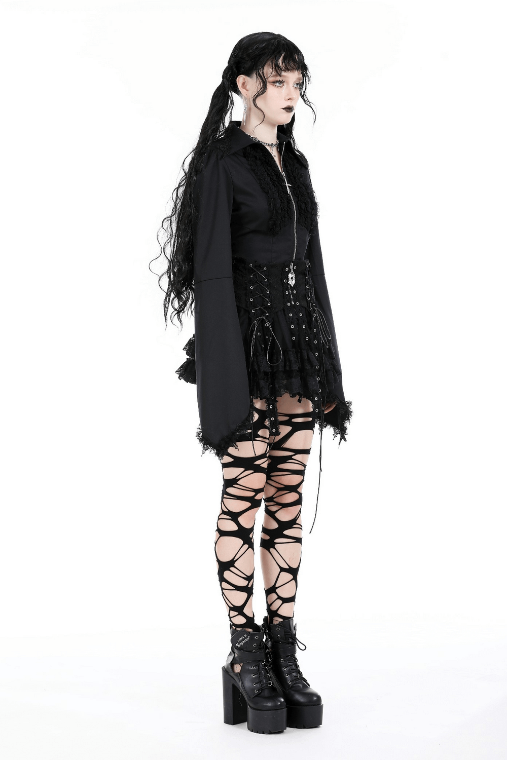 Dark gothic outfit with lace details, thigh-high laced stockings, and chunky platform boots for an edgy look.