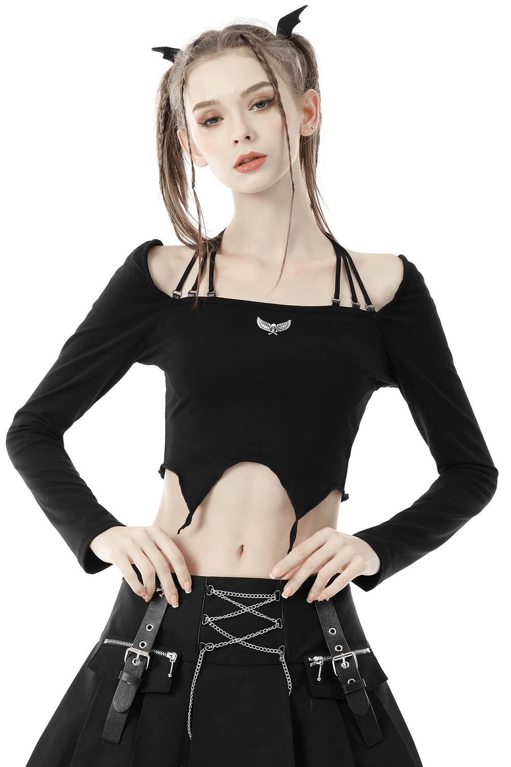 Edgy black Gothic halter top with multi-rope neckline, metal skull, and wing embellishments, styled for punk fashion.