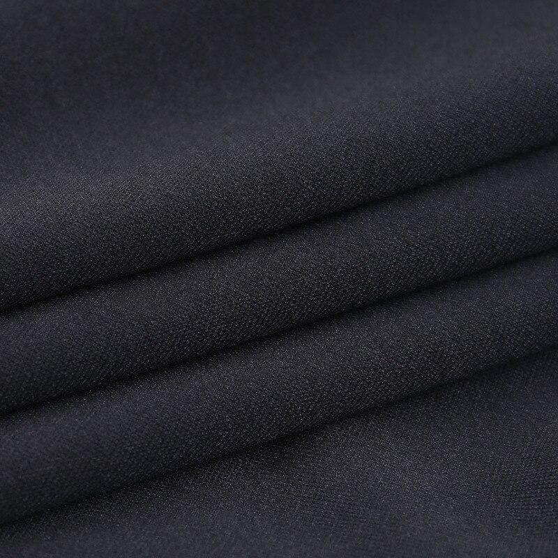 Close-up of black fabric texture for a gothic style dress, showcasing quality cotton and spandex mix.
