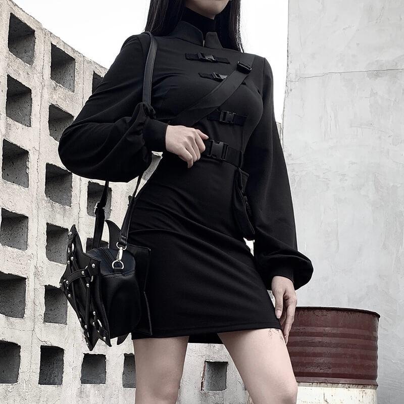 Dark Gothic style long sleeve black dress with turtleneck and pocket, featuring a waist sash and removable shoulder belt.