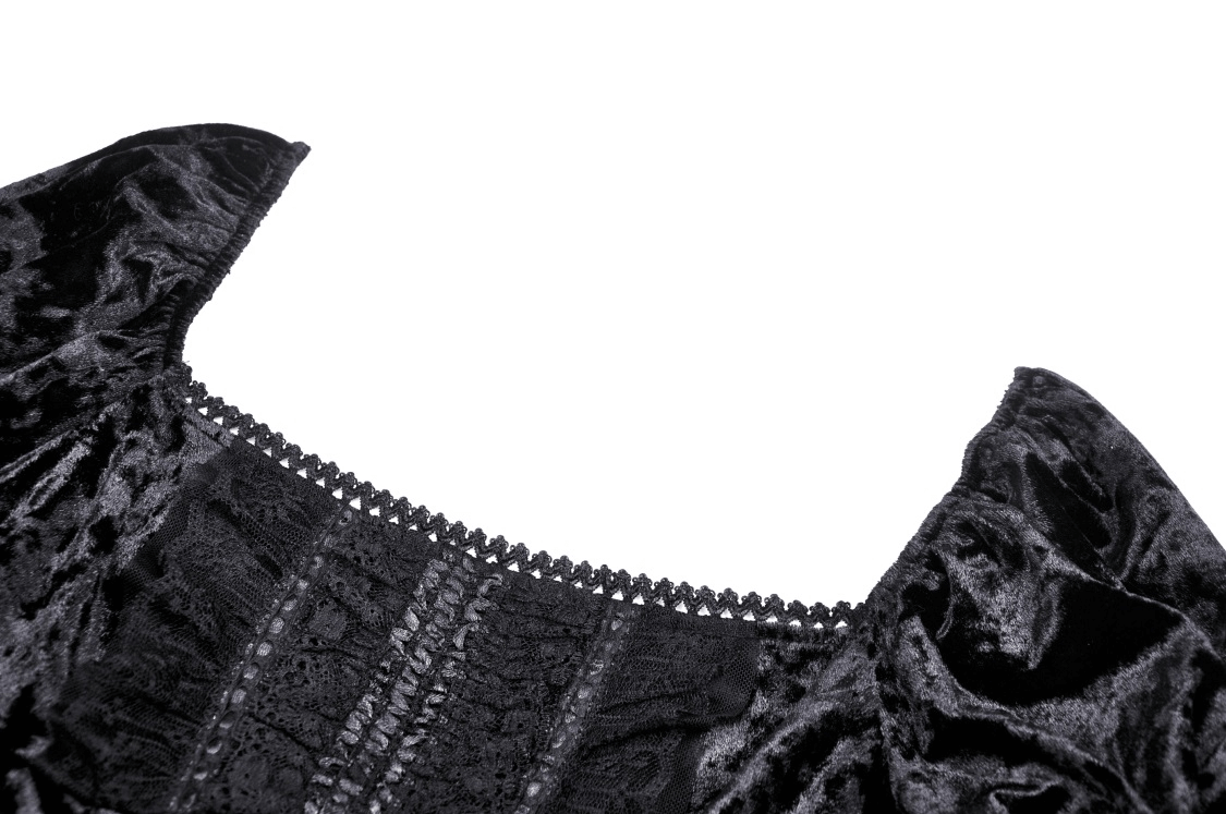 Detail of black velvet mini dress showcasing lace-trimmed neckline and sleeves, perfect for a gothic romantic look.