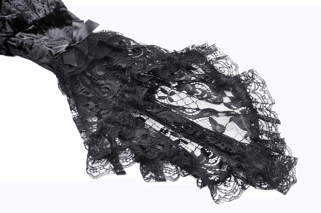 Close-up of sheer black lace sleeves with delicate ruffles and a satin bow for gothic fashion.