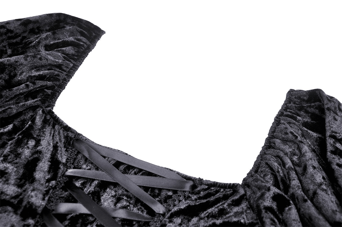 Close-up of the dark gothic velvet mini dress showcasing the delicate lace and ribbon details on the sleeves.